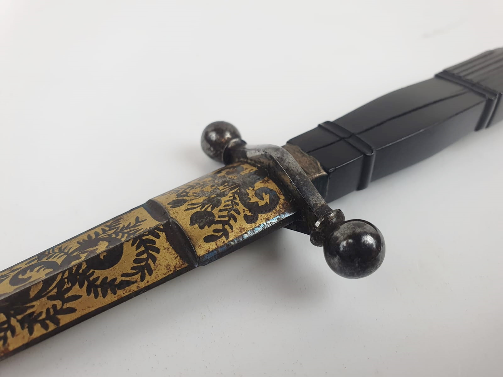 Romantic dagger, carved ebony handle, beautiful blade decorated with blue and gold patterns