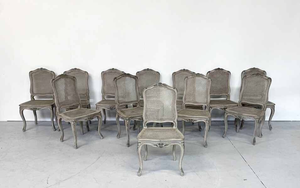 Series Of 12 Style L XV Cane Chairs. 