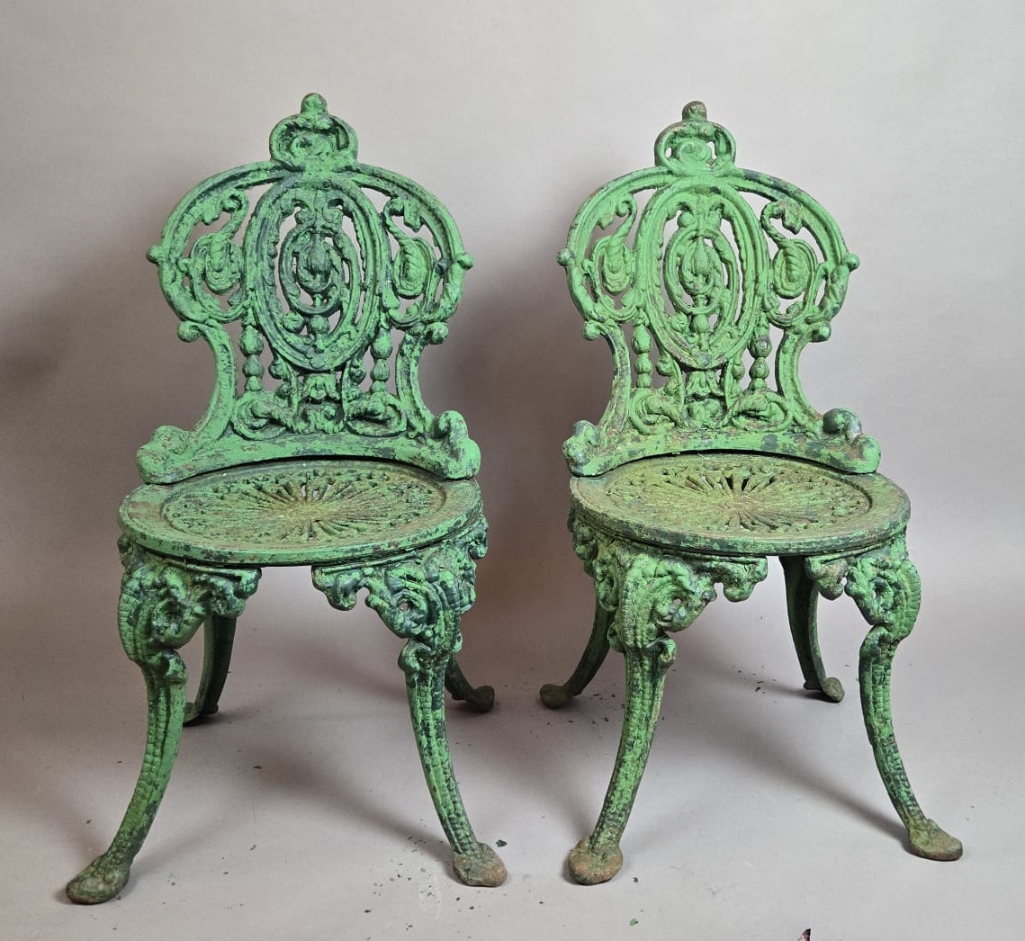 Set of 4 cast iron garden chairs