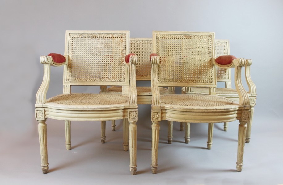 Set of 4 Louis XVI caned armchairs, 19th C.