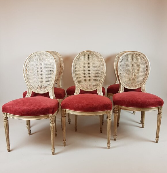 Set of 6 Louis XVI style chairs with caned backs.