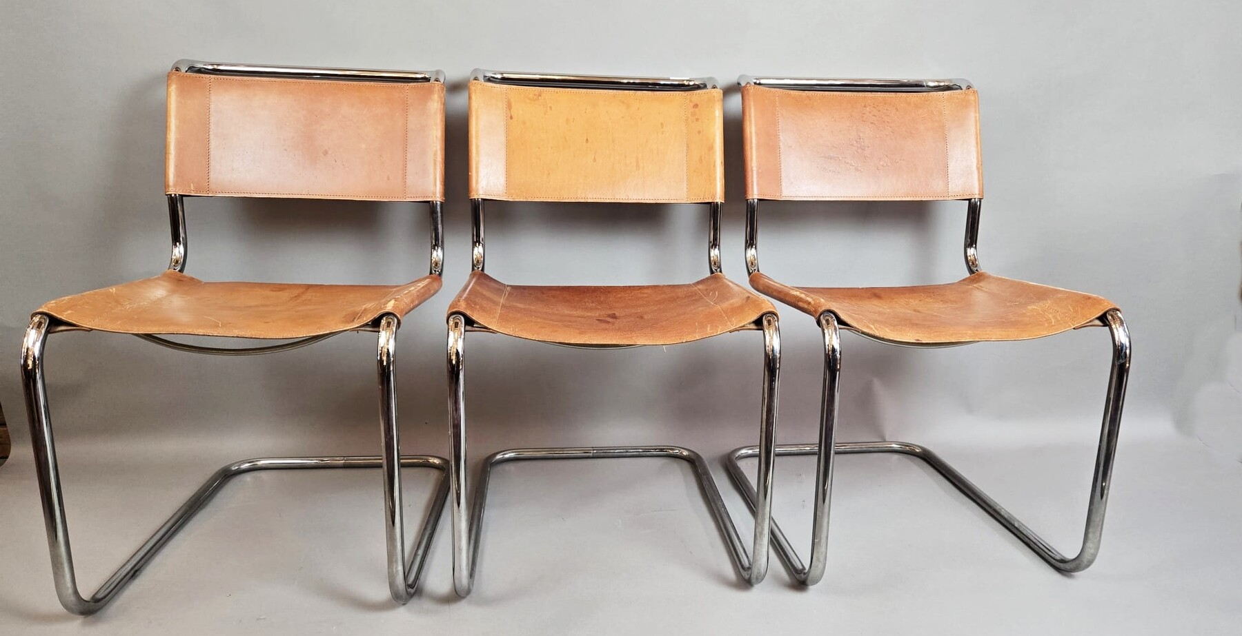 Set of 6 Thonet chairs in tubular metal, yellow leather seats.