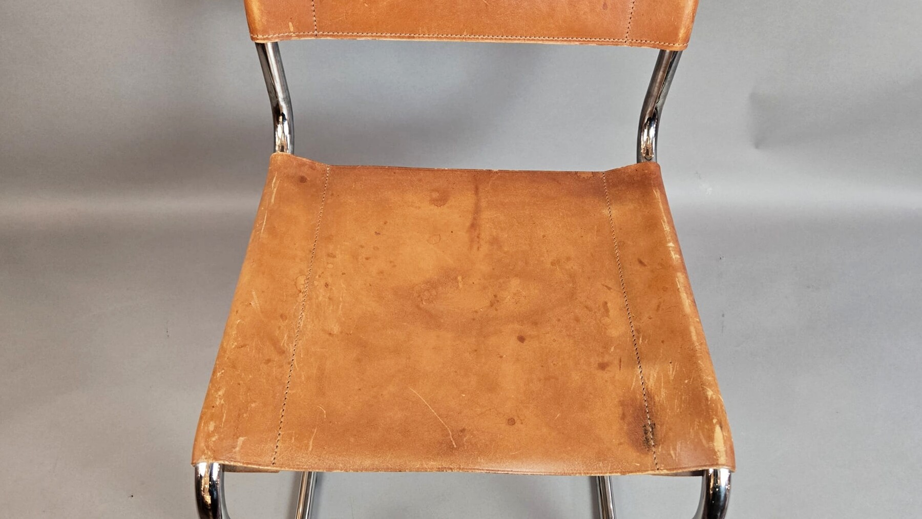 Set of 6 Thonet chairs in tubular metal, yellow leather seats.