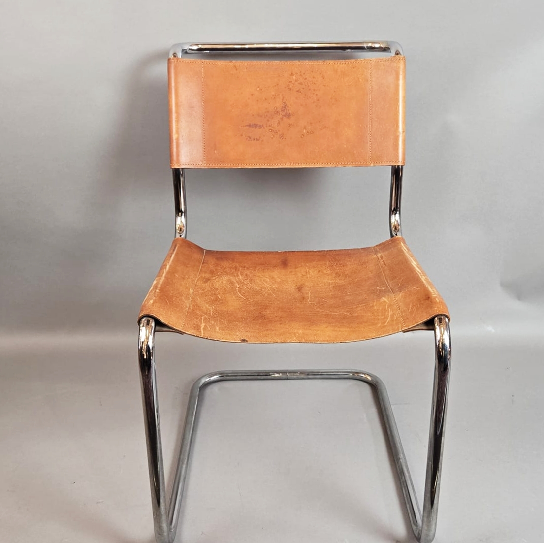 Set of 6 Thonet chairs in tubular metal, yellow leather seats.