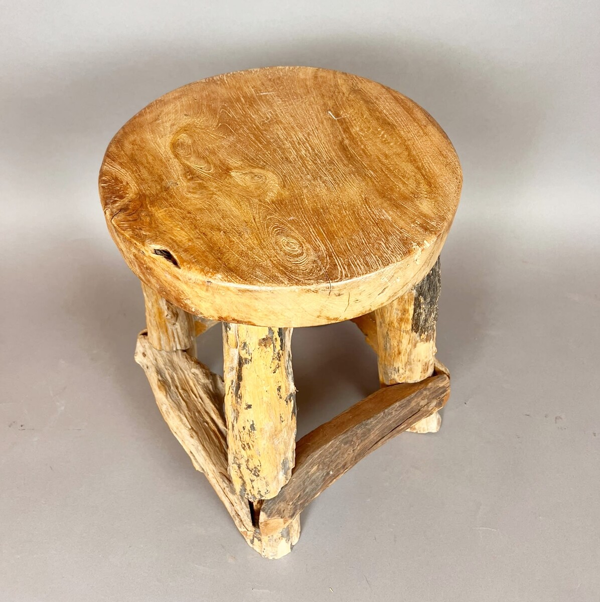 Set of four brutalist wooden stools