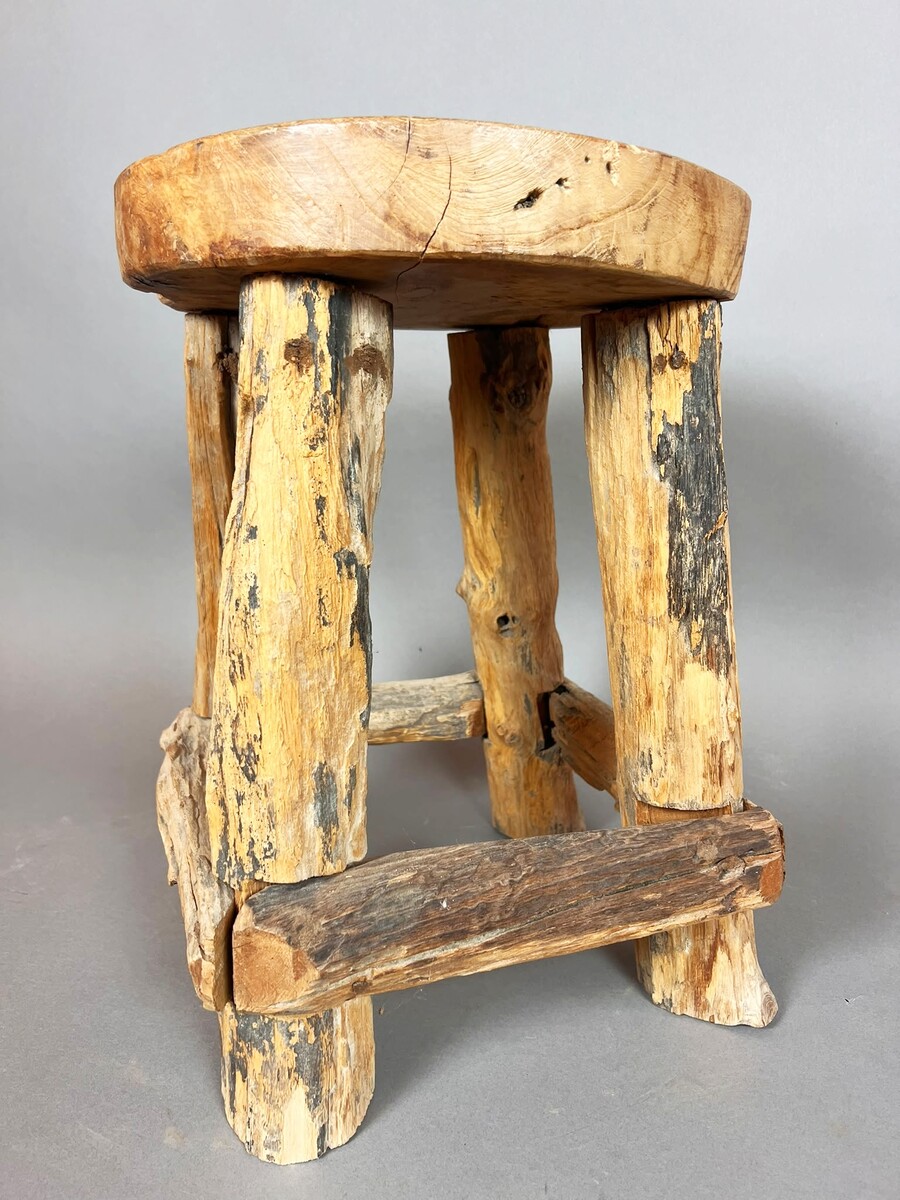 Set of four brutalist wooden stools