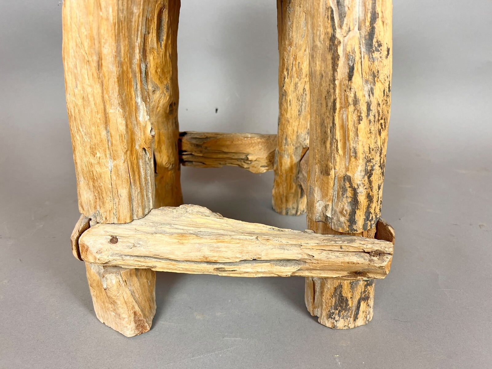 Set of four brutalist wooden stools