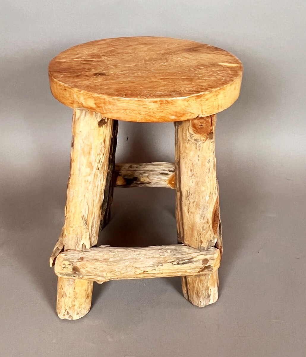 Set of four brutalist wooden stools