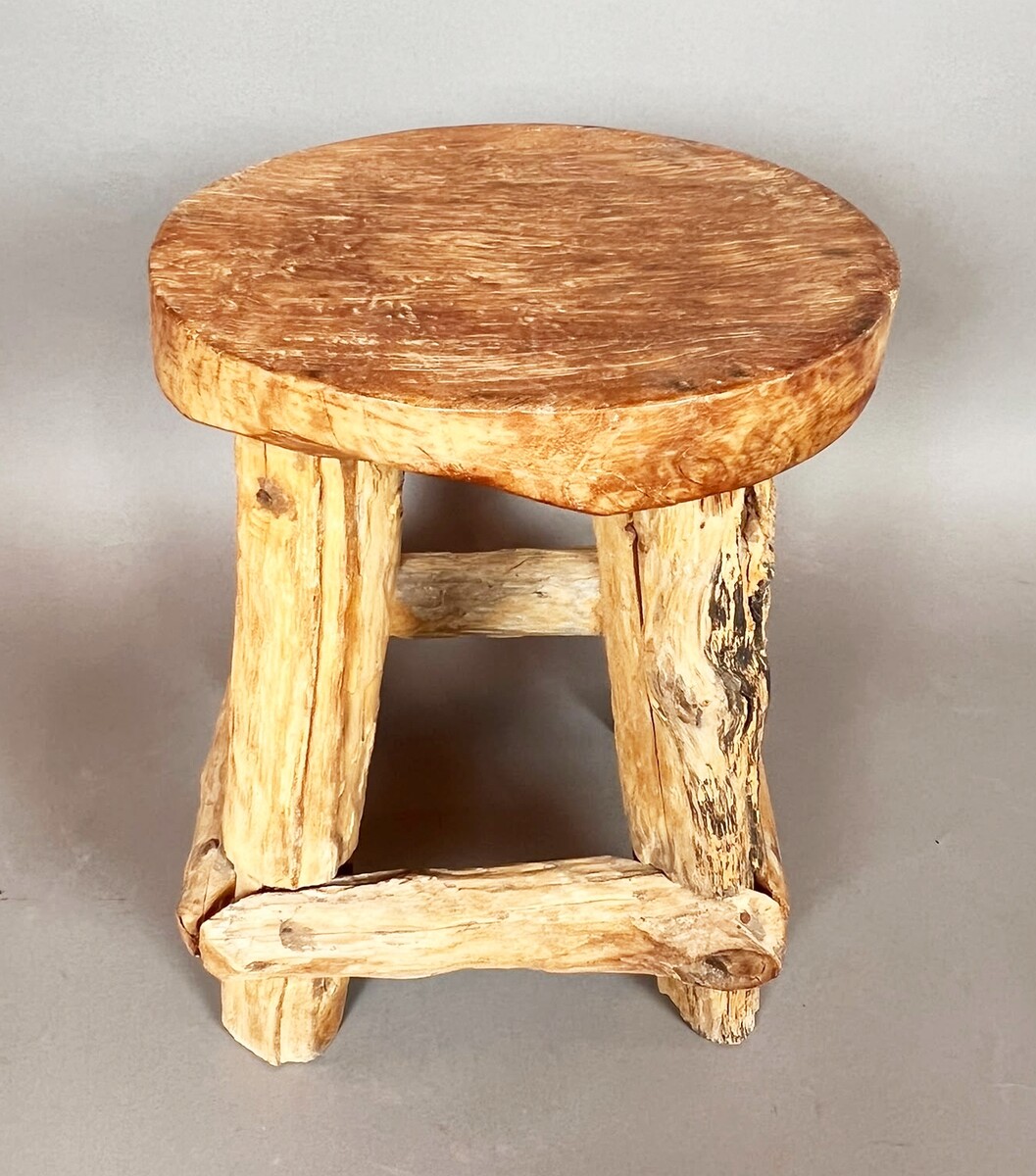 Set of four brutalist wooden stools