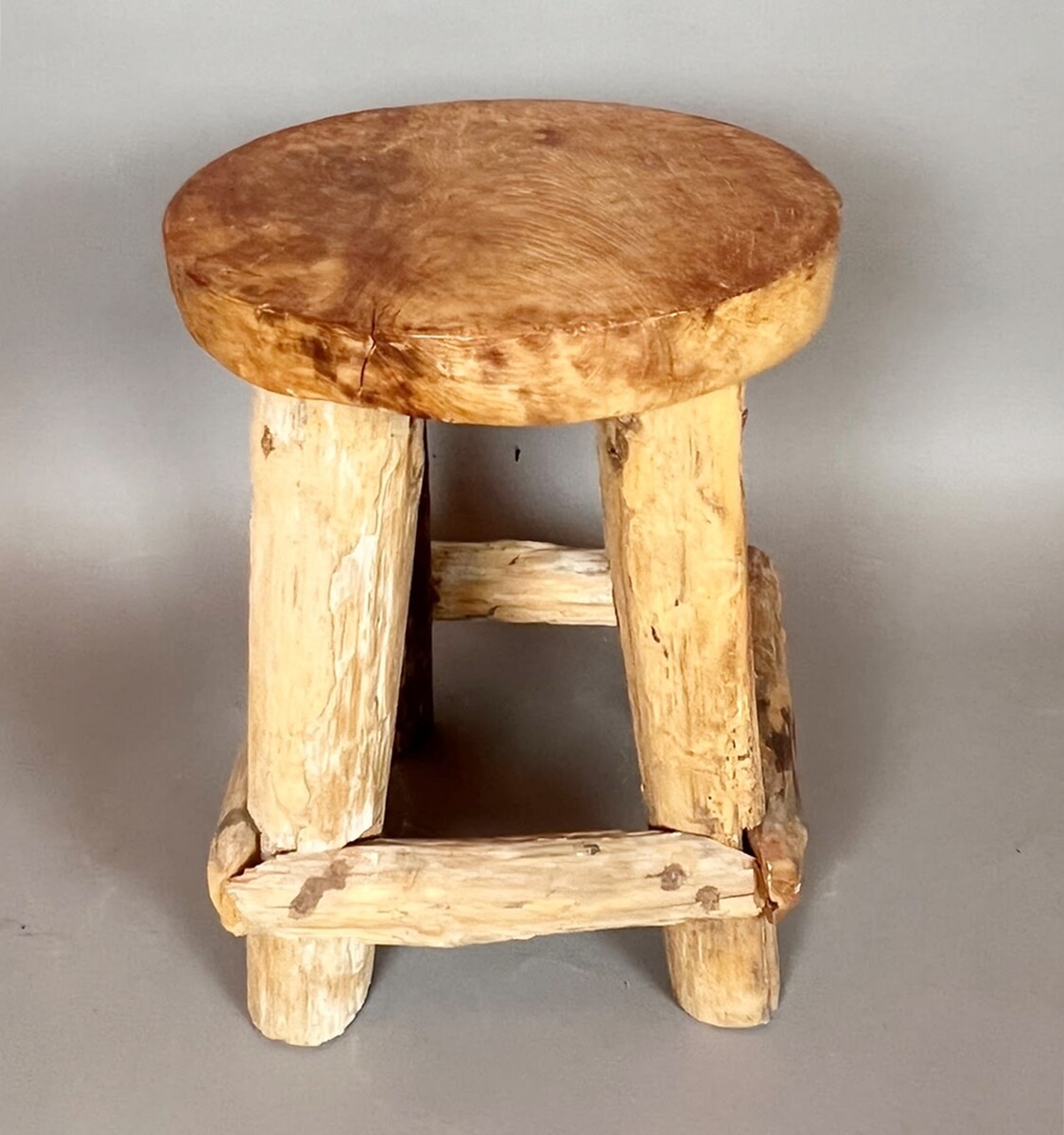 Set of four brutalist wooden stools