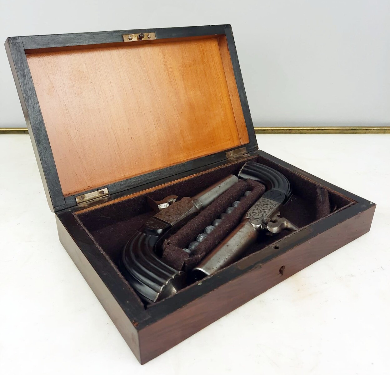 Small box, pair of percussion chest pistols