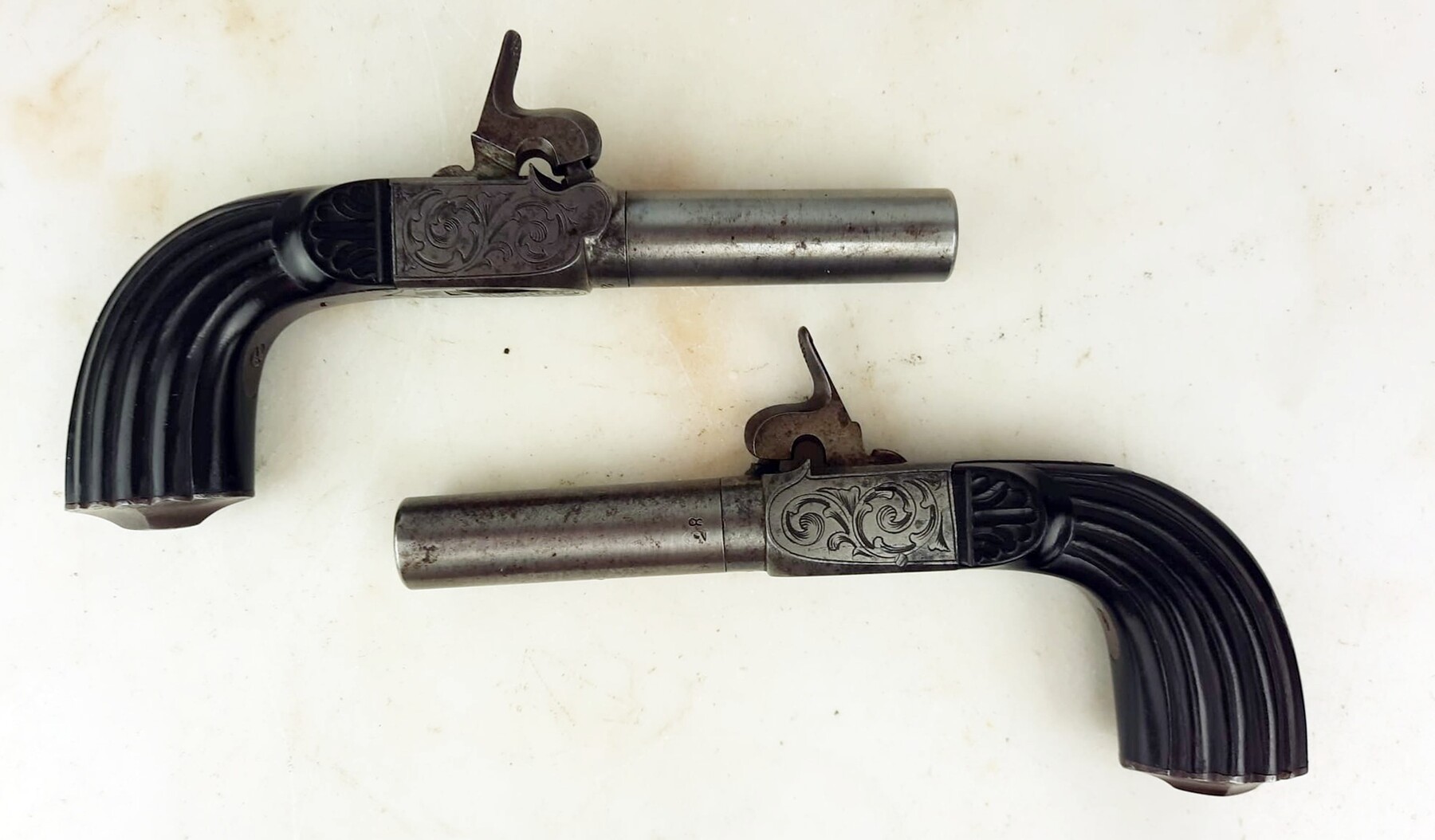 Small box, pair of percussion chest pistols