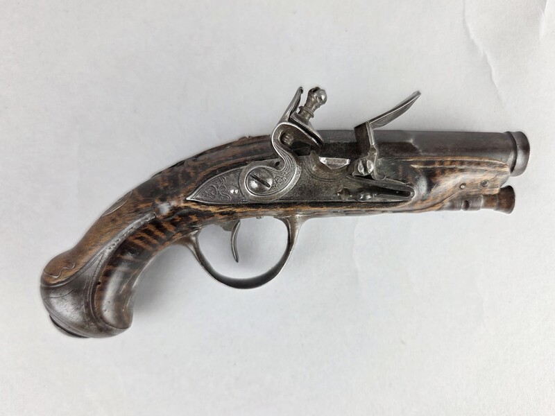Small French flintlock, circa 1750, walnut burl, silver wire, blue and gold barrel.