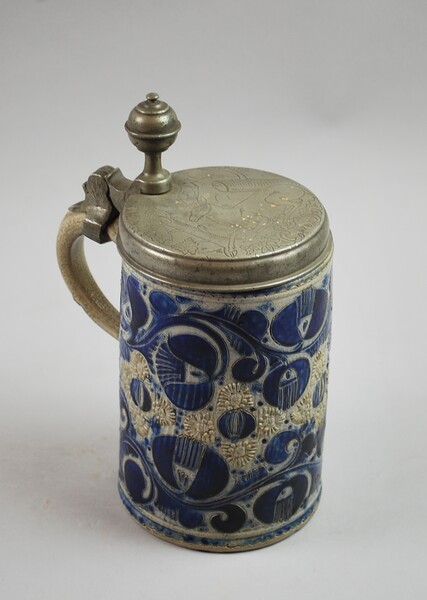 Stoneware beer mug and its engraved and dated pewter lid, 18th C.
