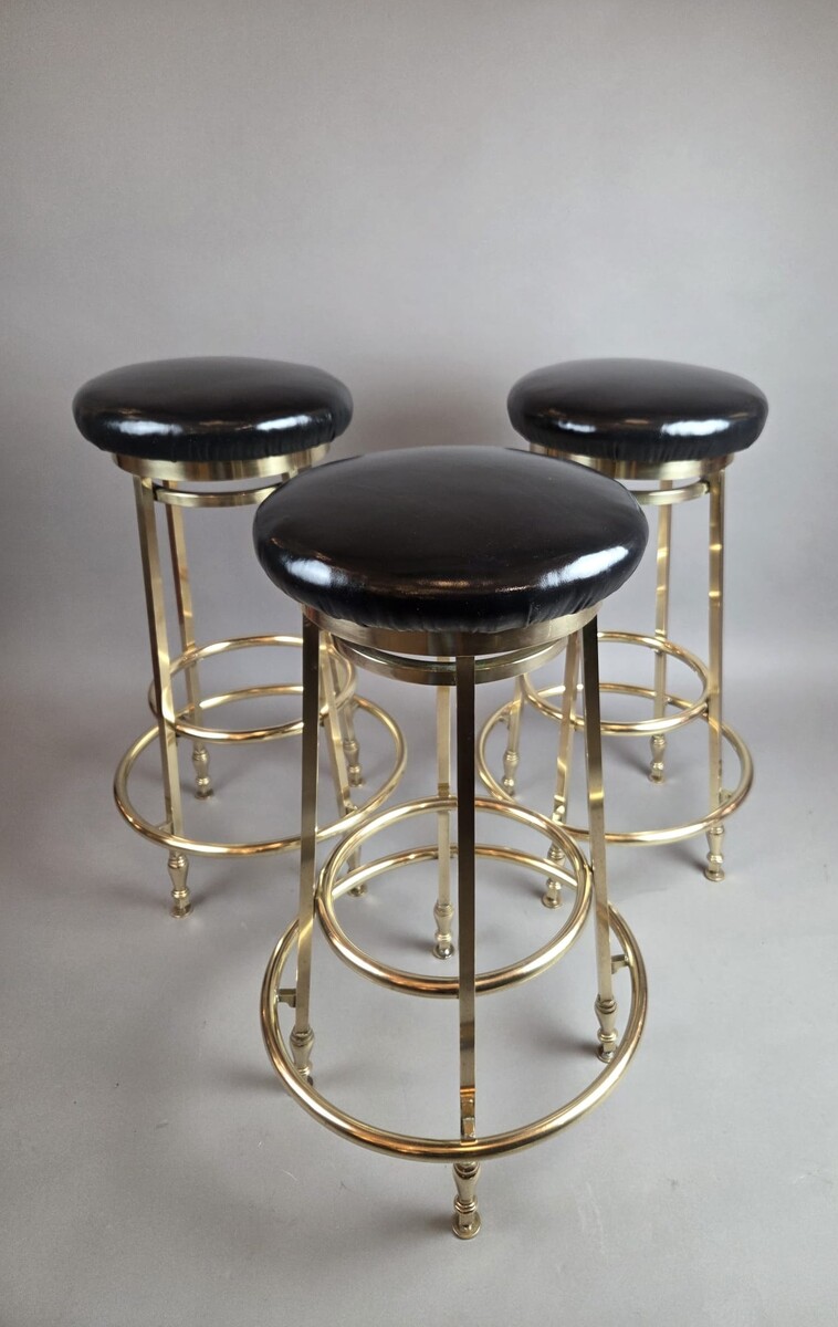 Suite of 3 brass barstools with leather seats, circa 1940