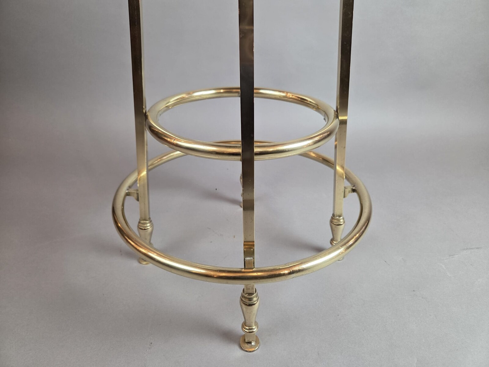 Suite of 3 brass barstools with leather seats, circa 1940