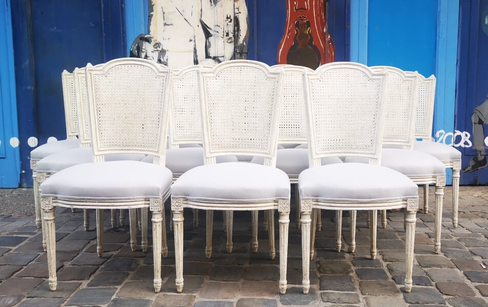 Suite of 8 Louis XVI style chairs with cane backs, early 20th