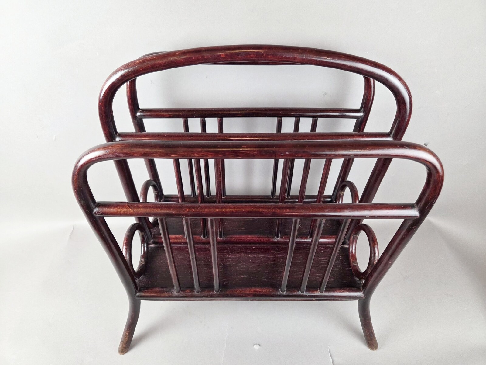 Thonet magazine rack in stained beech