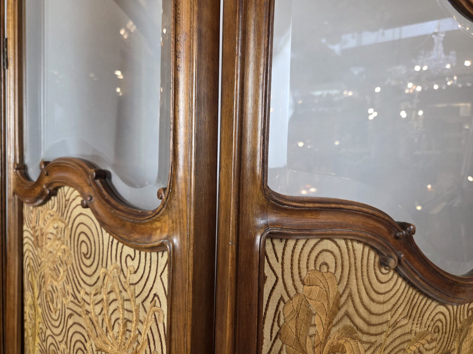 Three-panel Louis XV style screen in walnut and beveled glass, circa 1900