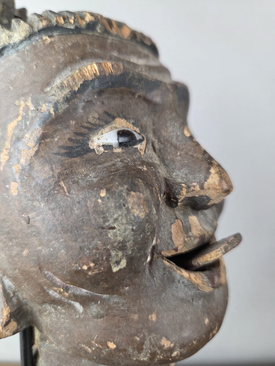 Two carved wooden puppet heads on a base, Burma, late 19th century