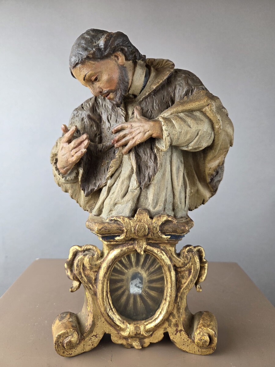 Two finely carved polychrome wooden reliquaries, 18th century