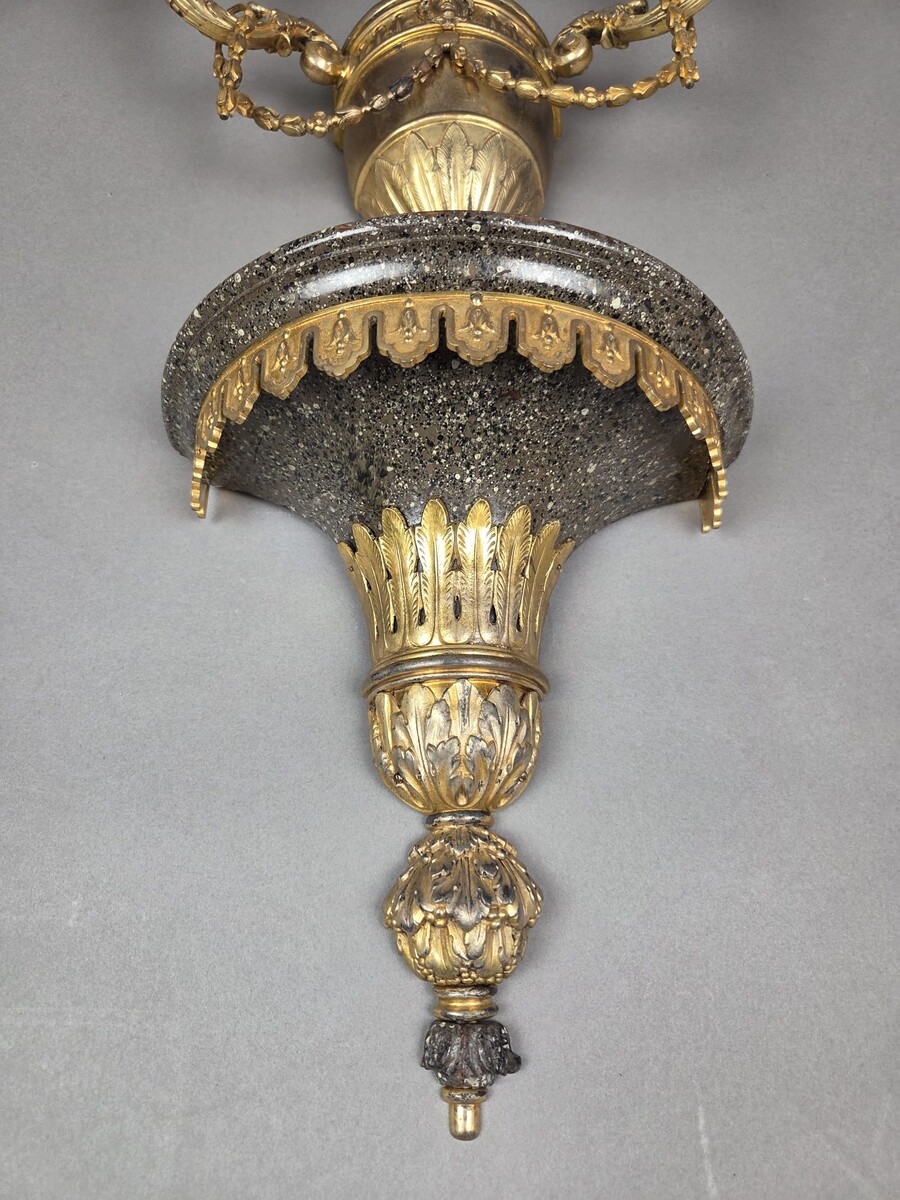 Wall lamp in bronze and brass and painted wood
