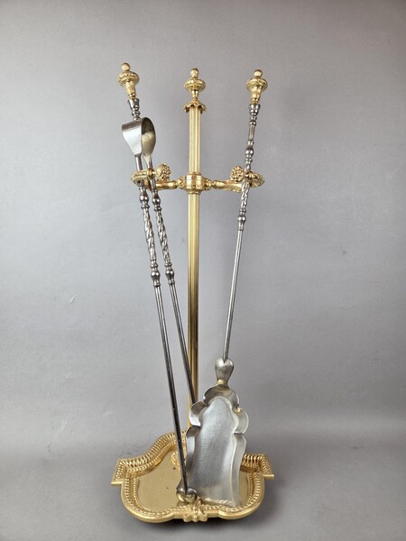Wrought iron and gilt bronze fireplace set, 19th century