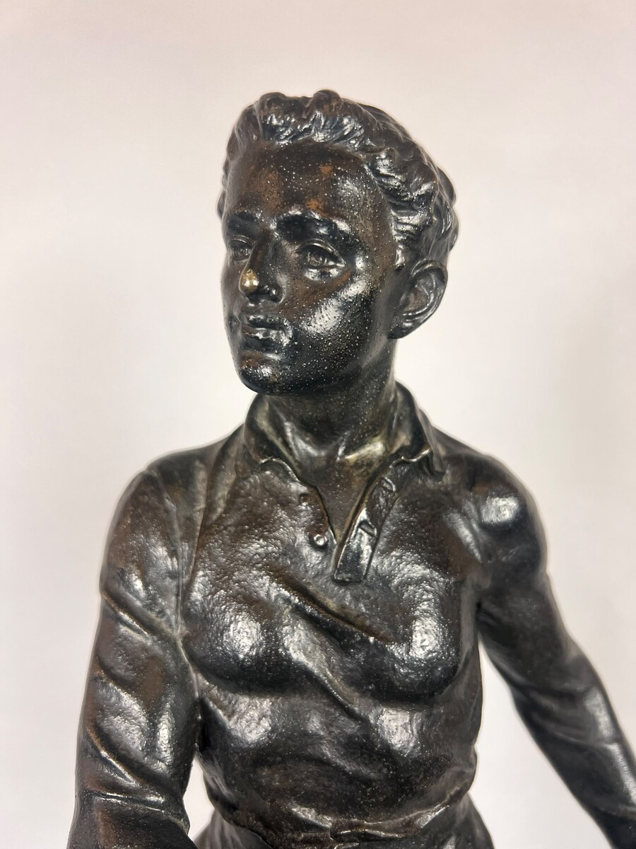 Zamak sculpture depicting The Rugby Player, signed by G. Demange.
